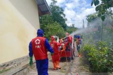 PMI Agam Semprot Disinfektan Daerah Sungai Cubadak Baso Pasca Jadi Zona Merah Covid-19